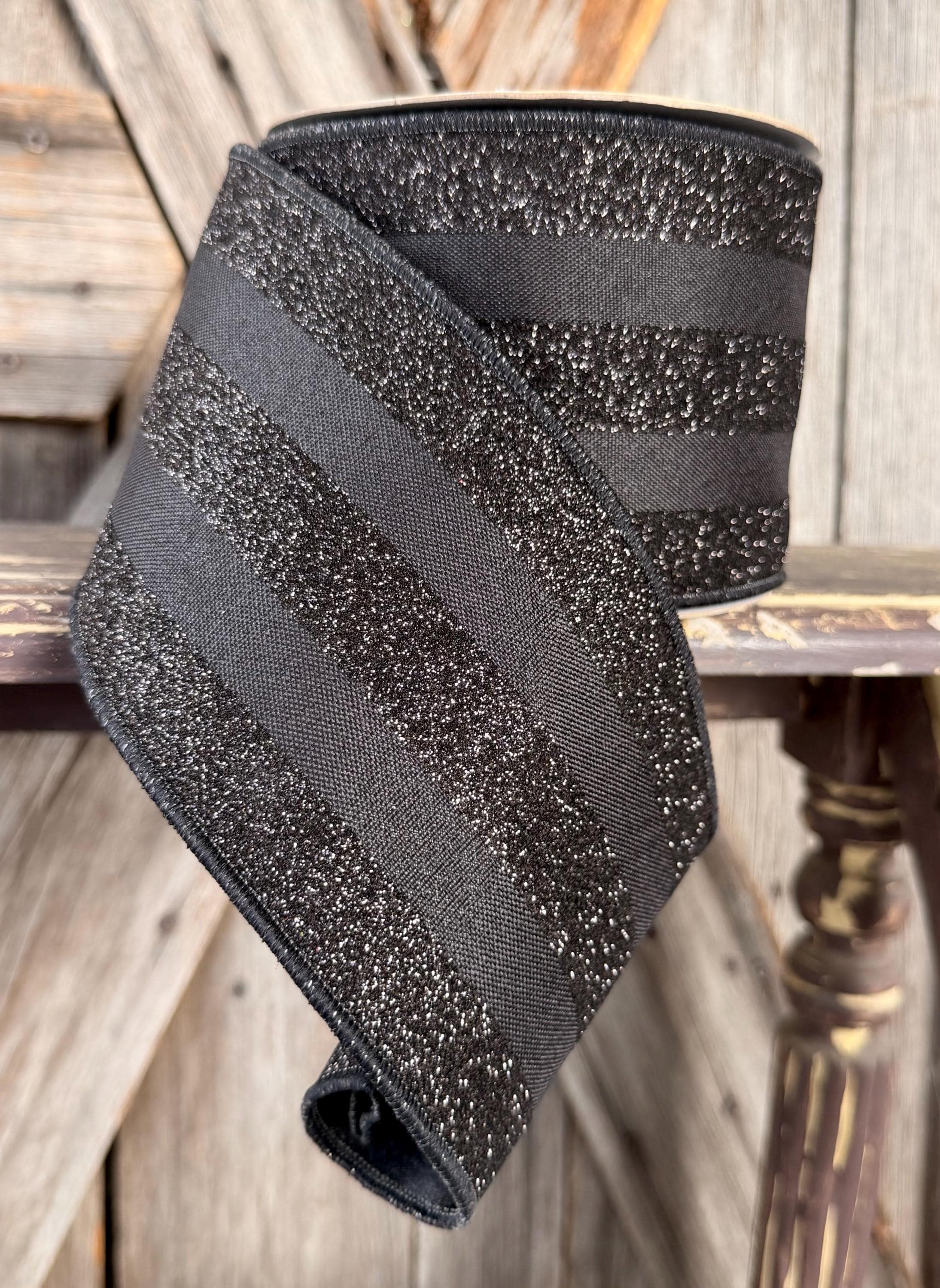 Black Glitter Stripe Delixe Wired Ribbon 4 Inch